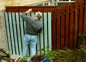 Fitting newly painted fence panels